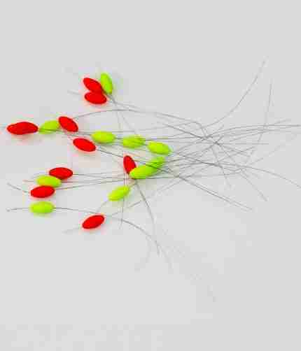 A pack of 10 vibrant 10mm micro fishing floats, 5 red and 5 yellow, neatly arranged and ready for your next fishing adventure.