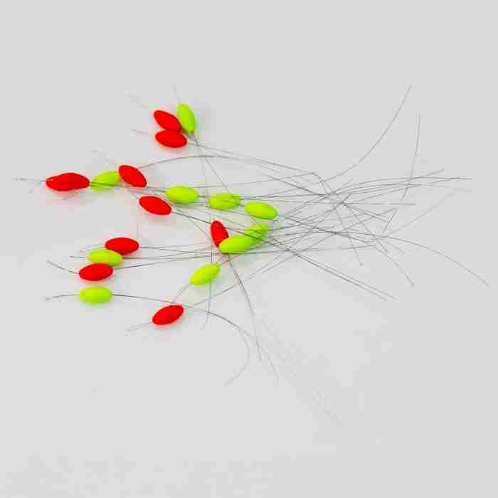 A pack of 10 vibrant 10mm micro fishing floats, 5 red and 5 yellow, neatly arranged and ready for your next fishing adventure.