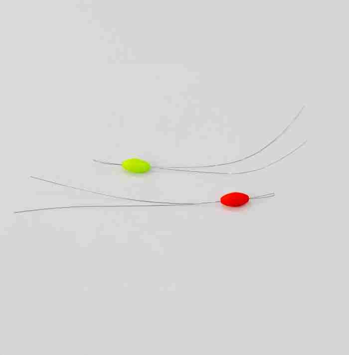 A pack of 10 vibrant 10mm micro fishing floats, 5 red and 5 yellow, neatly arranged and ready for your next fishing adventure.